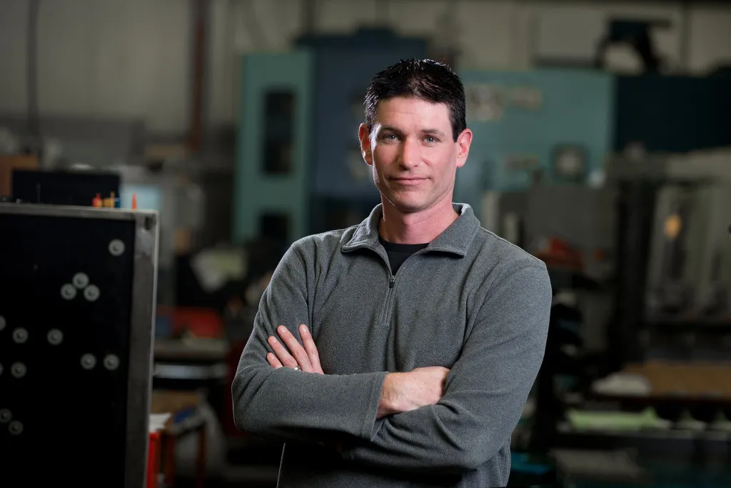 Portrait of Mike Nicolson, Production Manager, on the shop floor
